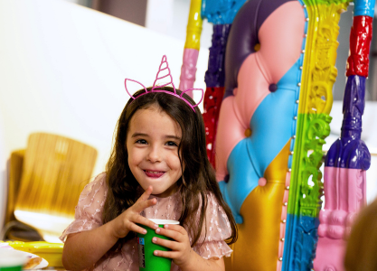 A group of kids celebrating a birthday party